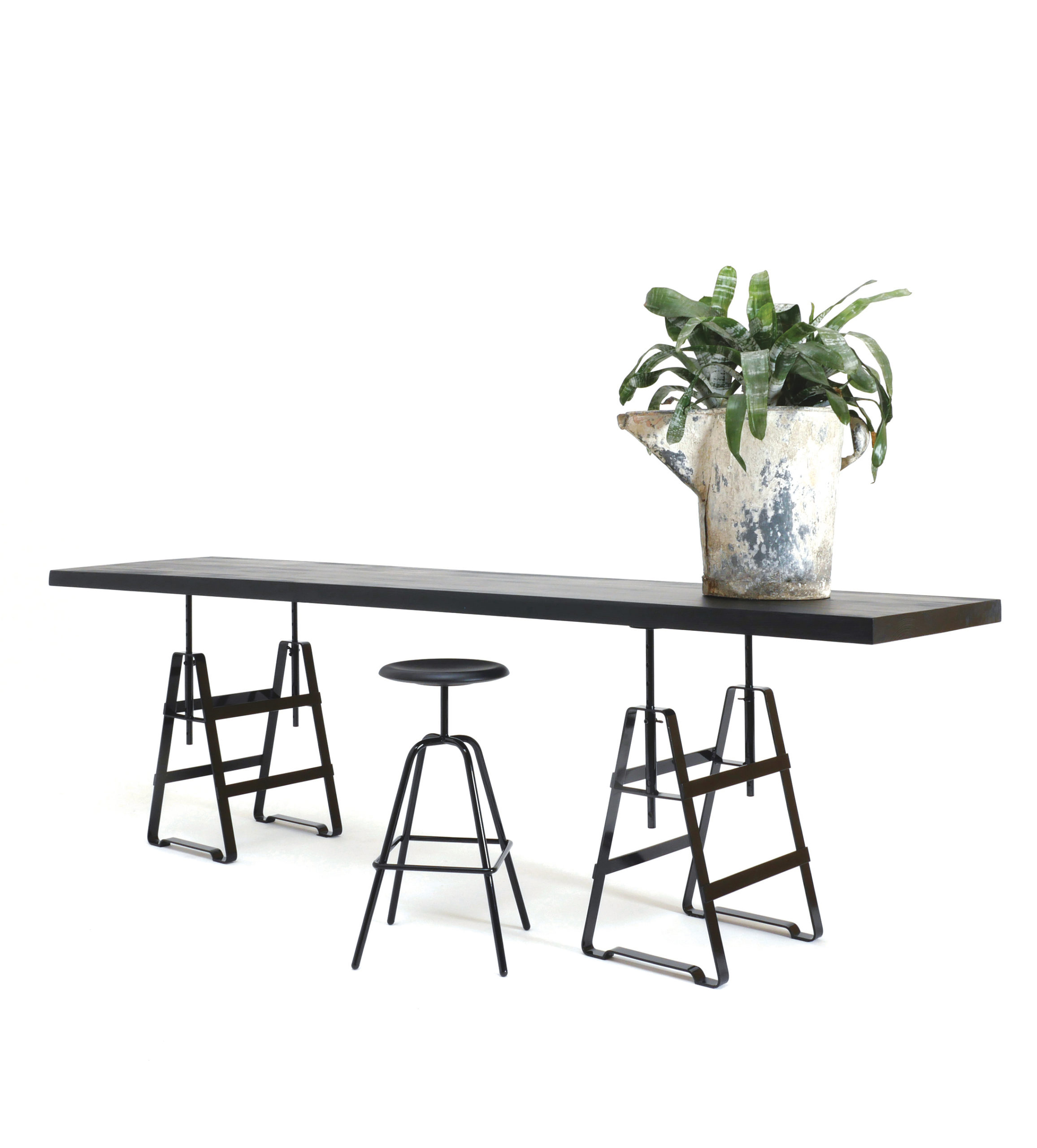Design Thesenfitz & Wedekind A height adjustable trestle made from crude steel powder-coated in black glossy, tabletop wood black from Zascho Petkow